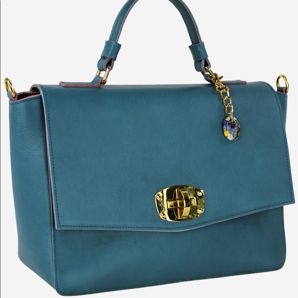 Terrida Handbag made in Italy 
never opened pocket